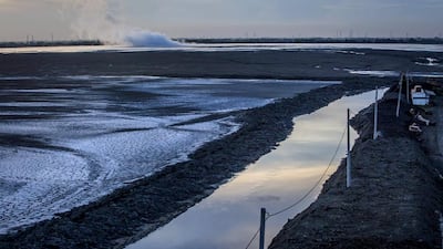 Steam comes out of an area of the mudflow. Damages caused by the eruption topped US$2.7 billion. Ulet Ifansasti / Getty Images