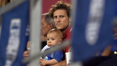 Diego Forlan looks on as he sits in the stands watching his Mumbai FC side in an Indian Super League semi-final match against Atletico de Kolkata at The Mumbai Football Arena Stadium on December 13, 2016. Indranil Mukherjee / AFP