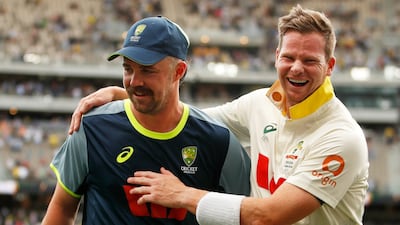 Australia captain Steve Smith, right, and Travis Head celebrate after winning the first Ashes Test. AP