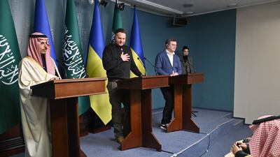 Saudi Foreign Minister Prince Faisal, left, Andriy Yermak, the Head of the Office of the President of Ukraine, centre, and Ukraine's Foreign Minister Dmytro Kuleba, right, at a press conference in Kyiv. AFP
