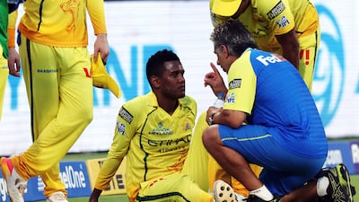 Chennai's Akeal Hosein receives medical attention after sustaining an injury. Reuters