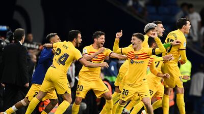 Barcelona players begin the celebrations after the victory over Espanyol confirmed the club as La Liga champions. Getty