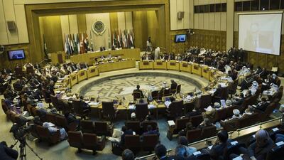 Arab foreign ministers take their seats for their meeting at the Arab League headquarters in Cairo on Sunday. Hassan Ammar / AP Photo