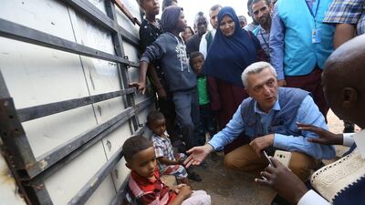 Filippo Grandi, UN High Commissioner for Refugees, visits a refugee camp providing temporary shelter to Libyans who were displaced from the town of Tawergha, near Tripoli, on June 18. AFP