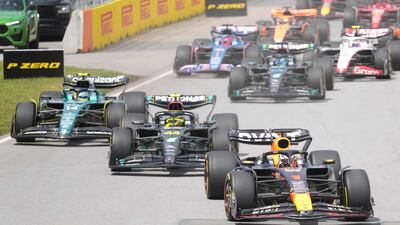 Red Bull's Max Verstappen ahead of Mercedes' Lewis Hamilton and Fernando Alonso of Aston Martin. AFP