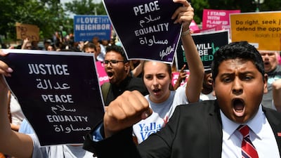 People protest the Muslim travel ban outside of the US Supreme Court in Washington, DC on June 26, 2018. Mandel Ngan/AFP
