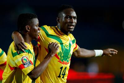 Mali forward Adama Traore, right,celebrates his second goal during the 2019 Africa Cup of Nations match against Mauritania. AFP
