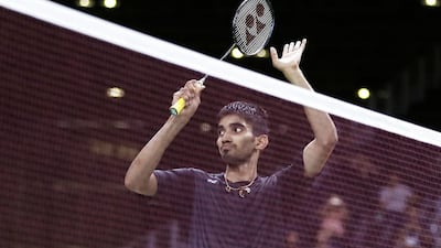 Srikanth Kidambi, of India, applauds the crowd following his loss to Lin Dan, of China, in a men's singles quarterfinal badminton match at the 2016 Summer Olympics in Rio de Janeiro, Brazil, Aug. 17, 2016. Kin Cheung / (AP