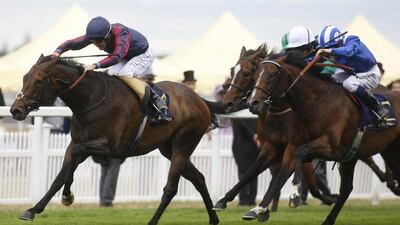 Tom Queally ridding The Tin Man, left, wins the Diamond Jubilee Stakes at Royal Ascot. Julian Herbert / Getty Images