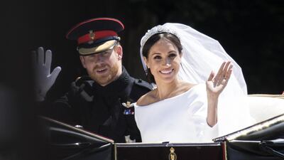 Prince Harry, Duke of Sussex and Meghan, Duchess of Sussex travel in the Ascot Landau Carriage as they leave the ceremony as man and wife. Getty
