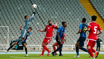 UAE's goalkeeper Khalid Eisa (up) vies with Honduras' defender Henry Figueroa (L) during a friendly football match between United Arab Emirates and Honduras at the Estadi Olimpic Lluis Companys in Barcelona. AFP