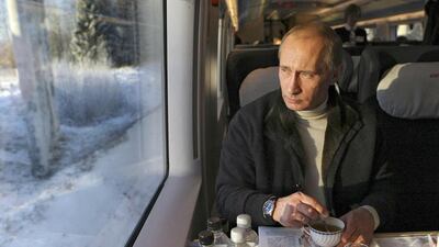 Russia’s Vladimir Putin travels in Russia’s first high speed train Sapsan in Leningrad Region in this 2009 photo. Ria Novosti / Alexei Druzhinin / Reuters