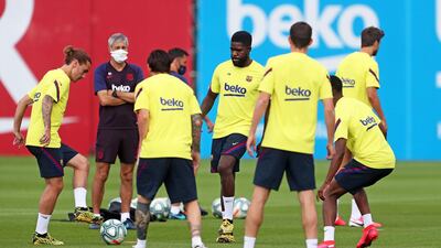 Barcelona manager Quique Setien leads his team's training session at Joan Gamper sports city. EPA