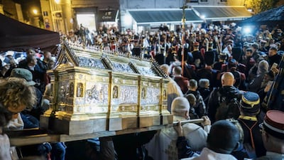The relics of Sainte Rolende are carried along the route. Olivier Hoslet / EPA