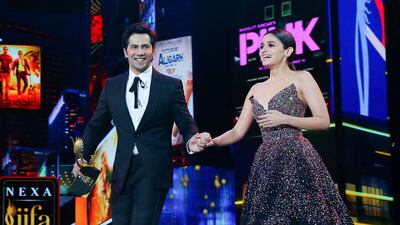 New York City hosted the IIFAs in 2017, with Shahid Kapoor and Alia Bhatt's film Udta Punjab winning in all the main categories. Karan Johar and Saif Ali Khan shared hosting duties. Pictured, Varun Dhawan presented Bhatt her Best Actress award.