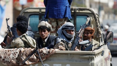 Houthi fighters ride on the back of a truck during clashes with forces loyal to former president Ali Abdullah Saleh in Sanaa. Reuters