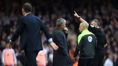 Chelsea manager Jose Mourinho is sent to the stands by referee Jon Moss. Tony O'Brien / Reuters