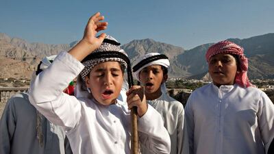 Ras al Khaimah - Saif al Nar, left, (his name means sword of fire) began practicing the Nadbah at age six and is now a full Nadeeb (Nadbah caller) leading friends and elders in the Shehhuh war cry used as a greeting of peace. Jeff Topping / The National