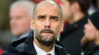 Bayern Munich manager Pep Guardiola shown prior to his team's Bundesliga match against Hannover on Saturday. Nigel Treblin / AFP / December 19, 2015