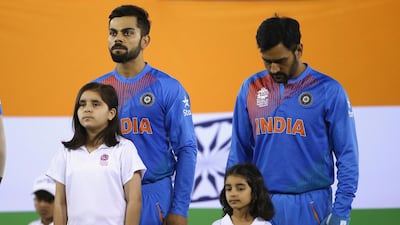 Virat Kohli and MS Dhoni during India's 2016 World T20 match against Australia in Mohali. Getty Images