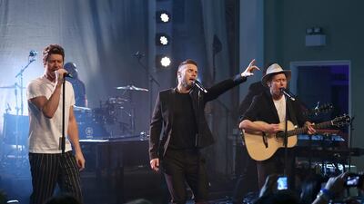 Take That members from left, Howard Donald, Gary Barlow and Mark Owen will perform in Dubai in October. Tim P Whitby / Getty Images