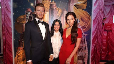 Sanaz Kollsrud, general manager of Madame Tussauds, with waxworks of David Beckham and Victoria Beckham at Madame Tussauds in Dubai. All photos: Pawan Singh / The National