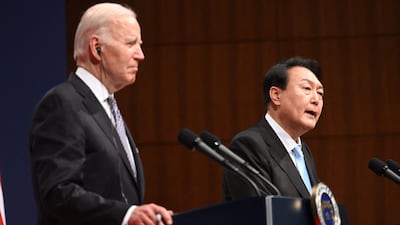US President Joe Biden and South Korean President Yoon Suk-yeol speak to journalists in Seoul, on Saturday. AFP