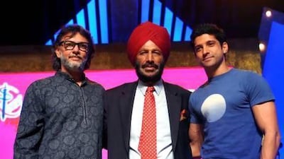 Milkha Singh, centre, Farhan Akhtar, right, and the director Rakeysh Mehra. AFP
