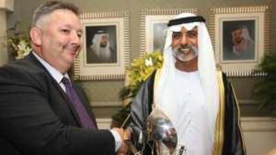 Sheikh Nahyan bin Mubarak, the Minister of Higher Education and Scientific Research, presents the Sheikh Mubarak bin Mohammed Prize for Natural History to Dr Mark Beech at his Majlis in Abu Dhabi.