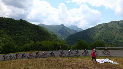 Riders climb in the San Zeno section on Stage 15. AFP