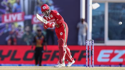 Oman's Aqib Ilyas plays a shot against Papua New Guinea. AFP