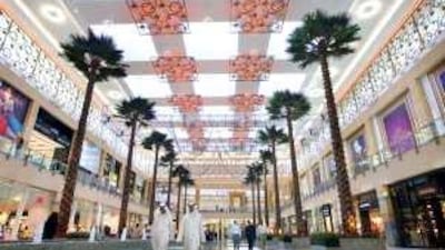 Developers will switch from building large malls to smaller community-themed centres as the price of land falls.