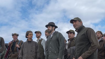 Sheikh Hamdan with friends dressed in clothing synonymous with the British outdoors