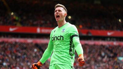 Crystal Palace goalkeeper Dean Henderson celebrates after Eberechi Eze scores their first goal. Reuters