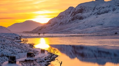 The Grenadier convoy trudges past Loch Laggan