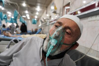 A man uses an oxygen mask at a hospital in Baghdad. Those with respiratory health problems are at risk during dust storms. Reuters