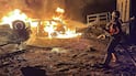 A civil defence worker battles a fire caused by an Israeli strike on Khan Younis, in southern Gaza. Reuters