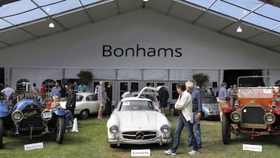 Cars are displayed during a preview for the Bonhams Quail Lodge car auction in Carmel, California. High-end sales, fuelled both by more mass-market brands offering upscale vehicles and more premium marques offering cheaper choices, have outpaced the US auto industry’s growth since 2012, according to Edmunds.com, a website that tracks auto sales. Michael Fiala / Reuters