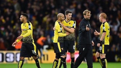Jurgen Klopp congratulates Watford players after their heavy victory against Liverpool. Ben Stansall / AFP