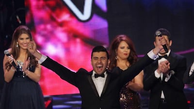 Sattar Saad from Iraq celebrates after he was named the winner. Anwar Amro / AFP photo