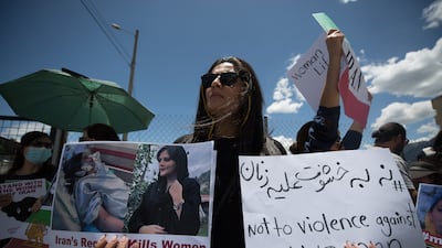 Protesters at a demonstration outside the Iranian embassy in Quito, Ecuador. EPA
