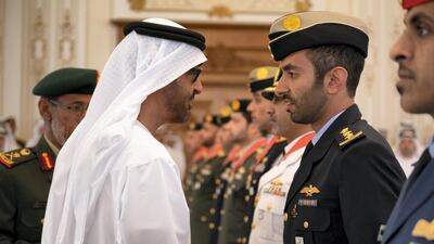 Sheikh Mohamed bin Zayed presents an Emirates Military Medals to members of the UAE Armed Forces, Ministry of Interior and Abu Dhabi Police during a Sea Palace barza.