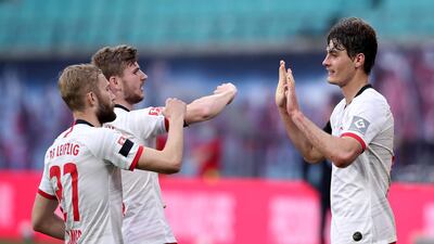 Leipzig's Patrik Schick, right, celebrates scoring with his team-mates Konrad Laimer and Timo Werner. AFP