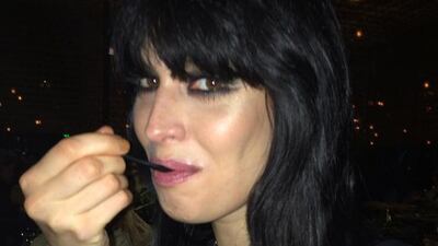 Straight off the runway, a model tucks into tabbouleh after Chanel’s Cruise Collection 2014/2015. Rebecca McLaughlin-Duane / The National