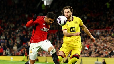 Manchester United midfielder Casemiro and Sheffield United's Ben Brereton Diaz battle for the ball. Reuters