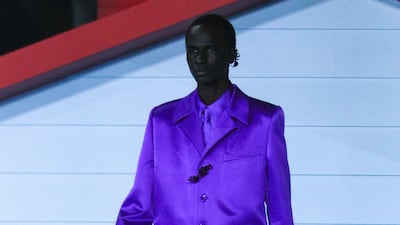 A royal purple silk suit. EPA