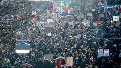 People gather at Willy-Brandt-Platz in Nuremberg. AP