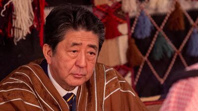 Mr. Abe wears a traditional costume as he meets with Crown Prince Mohammed bin Salman in Riyadh.
