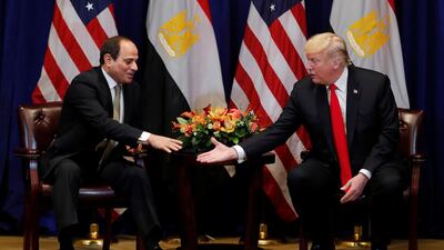 Egypt's President El Sisi reaches to shake hands with US President Donald Trump. Reuters