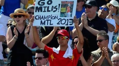 A fan holds up a sign cheering on Milos Raonic against Rafael Nadal during men's Rogers Cup tennis tournament final action at Montreal on Sunday. Raonic lost but moved into the top 10 in the world rankings.